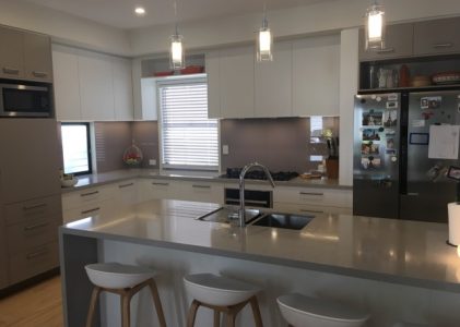 Polytec Kitchen with Matching Living Room Cabinetry